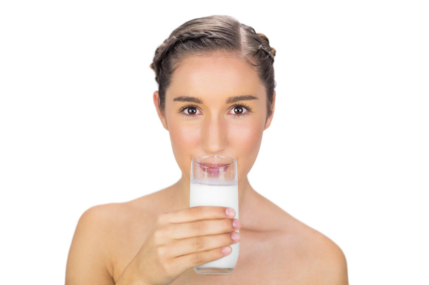Pretty young model drinking milk - Фото, изображение