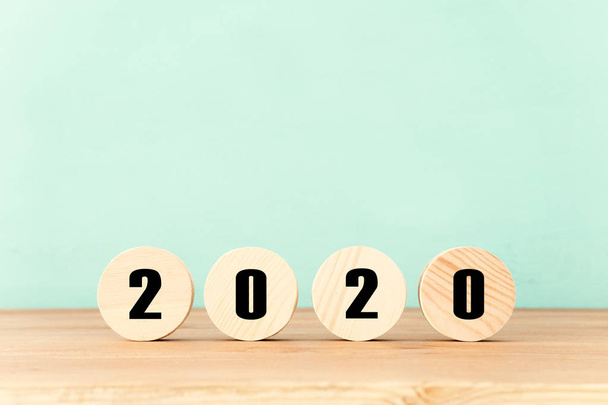 New year 2020 concept. business idea over wooden board - Foto, afbeelding