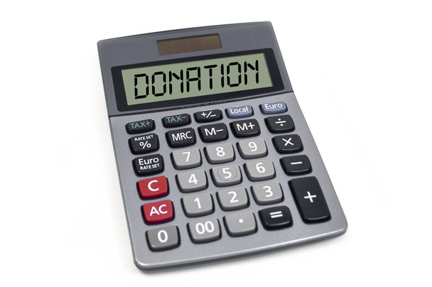 Calculator isolated with word donation on lcd display - Фото, зображення