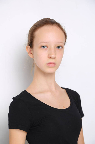 Caucasian teen girl studio portrait - 写真・画像