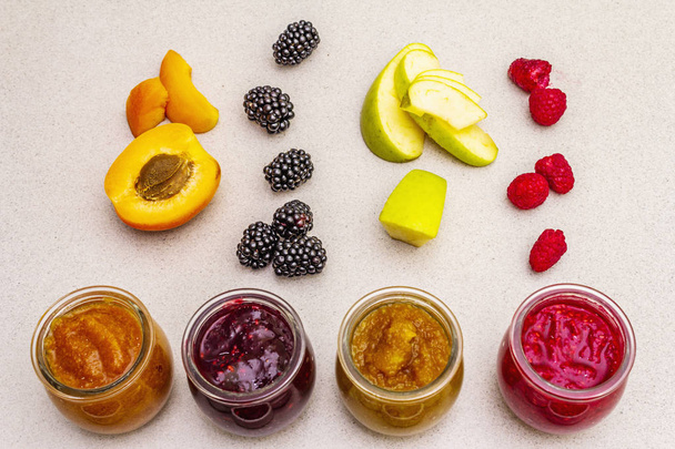 Healthy organic homemade assortment of fruit puree - Fotó, kép
