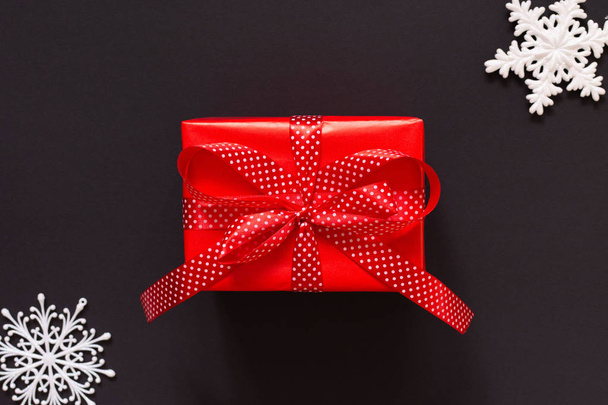 Gift box on black background - Foto, Imagen