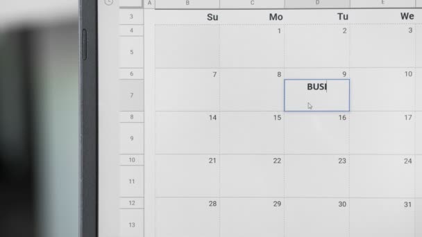 この日を記憶するためにカレンダーに9日にビジネスミーティングを書く. - 映像、動画