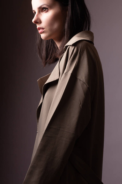 beautiful young girl in a trench coat,  - Photo, Image