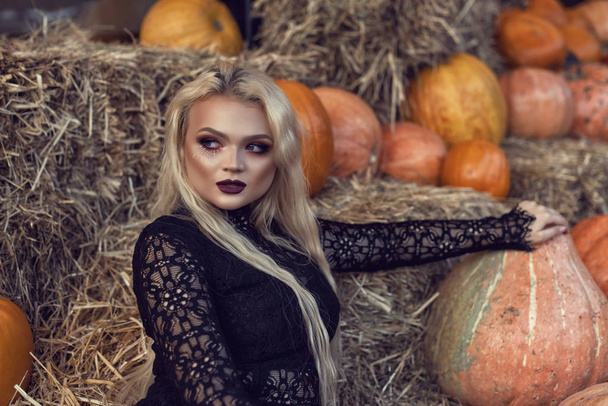 Halloween location with a young blonde - Фото, изображение