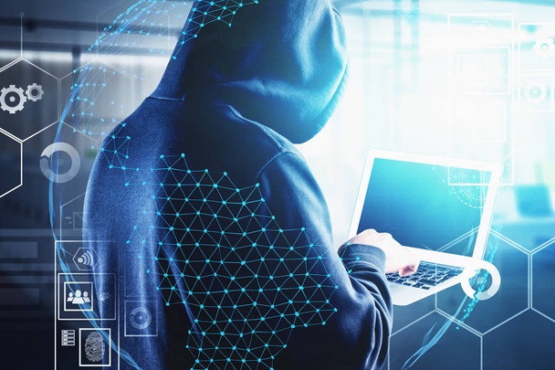Hacker with laptop in office, cybersecurity - Fotoğraf, Görsel