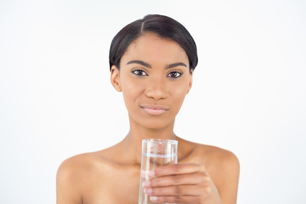 Peaceful attractive model holding glass of water - Fotó, kép
