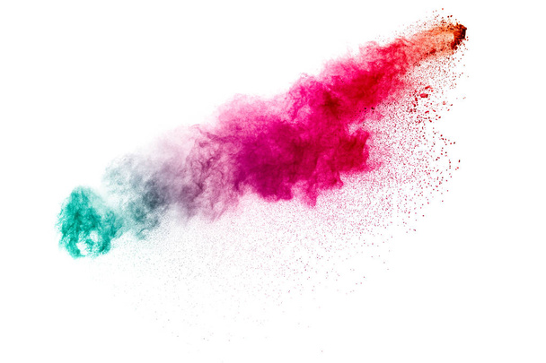 Kolorowy wybuch proszku na białym tle. Abstrakcyjny pastelowy kolor cząstek pyłu splash. - Zdjęcie, obraz