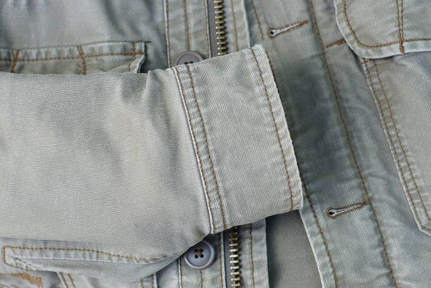 veste en coton gris texture tissu avec manches
 - Photo, image