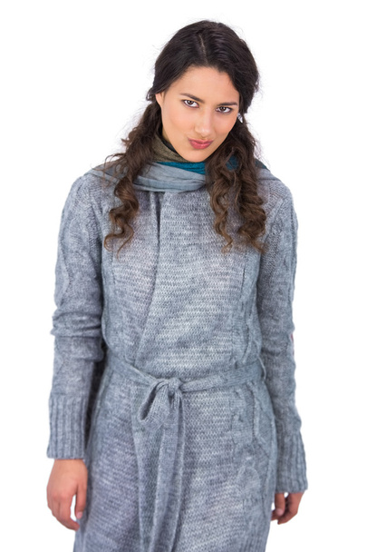 Peaceful curly haired model with winter clothes posing - Foto, Bild