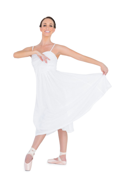 Cheerful young ballet dancer posing - Foto, imagen