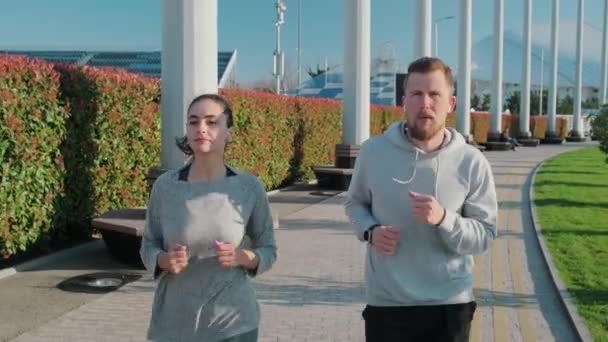 Friends jogging together in the city - Felvétel, videó