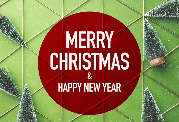Merry Christmas and Happy New Year in red circle with green chri - Foto, Imagen