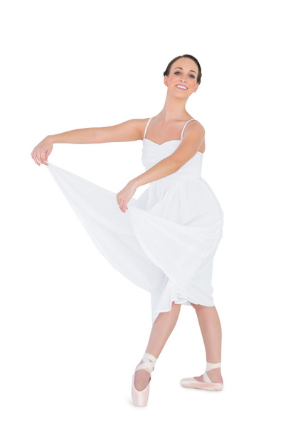 Smiling young ballet dancer posing - Fotó, kép
