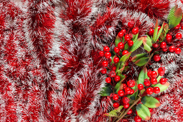 Red Christmas garland and hawthorn branch - 写真・画像