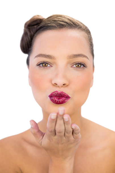 Attractive woman with red lips blowing air kiss - Foto, Imagem