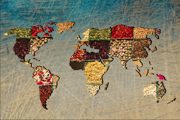 Грубо викладена карта світу з верандою наповнення спецій
 - Фото, зображення