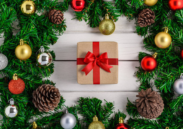 Christmas fir tree with decoration on white wooden board - Zdjęcie, obraz