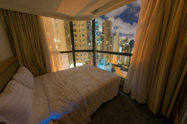 Vista notturna visibile dall'hotel di Hong Kong
 - Foto, immagini
