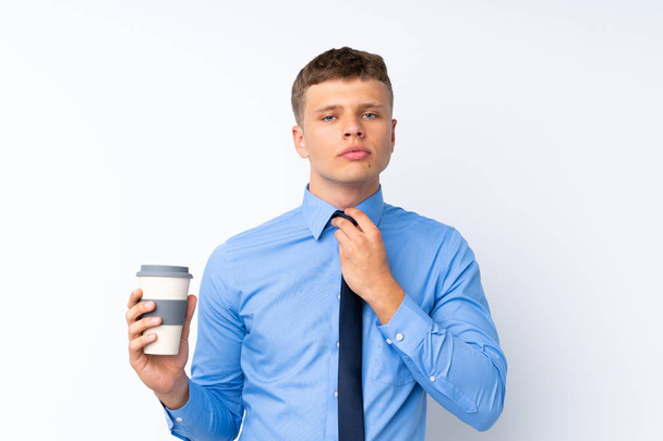 Young handsome businessman over isolated white background - Φωτογραφία, εικόνα