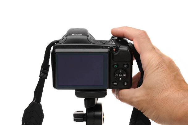 digitale fotocamera op een witte achtergrond - Foto, afbeelding