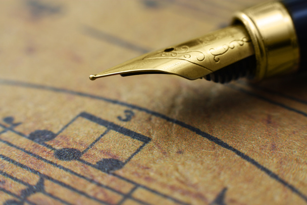Музичний лист і ручка
 - Фото, зображення