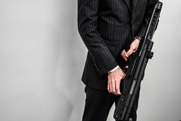 Businessman to fight with a machine gun - Foto, Imagem