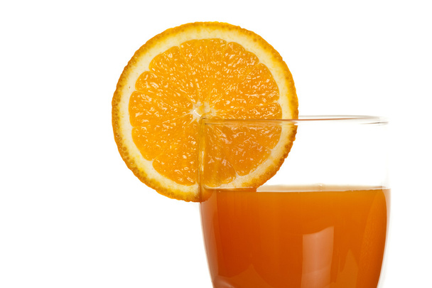 χυμό πορτοκαλιού με φέτες εσπεριδοειδή - Φωτογραφία, εικόνα