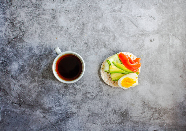 Gluten-free toast with avocado and fresh salted salmon, eggs and - Zdjęcie, obraz