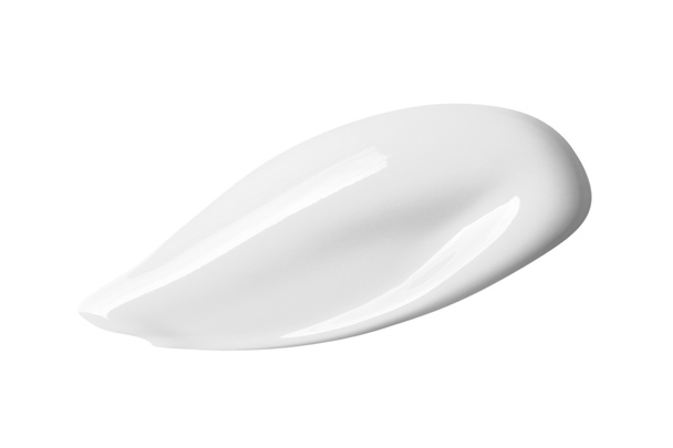 Frottis de frottis de crème cosmétique blanche isolé sur fond blanc
 - Photo, image