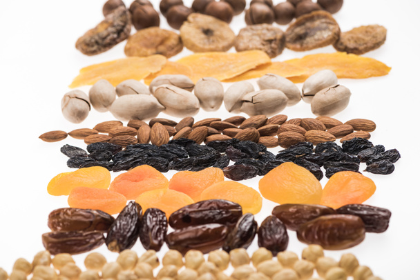 assorted turkish dried fruits and nuts isolated on white - Foto, afbeelding
