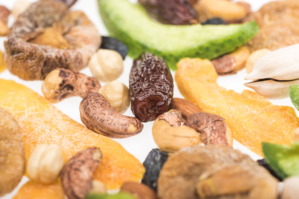 close up view of Turkish assorted nuts, dried fruits and candied fruit isolated on white - Photo, Image