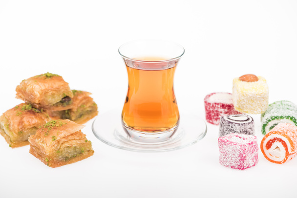 cup of tea near baklava, turkish delight isolated on white - Photo, Image