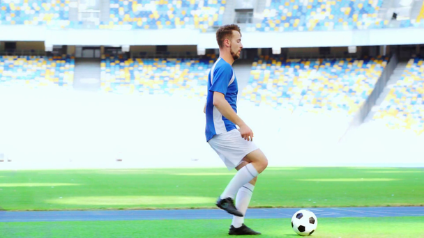 football player playing with ball  - Footage, Video