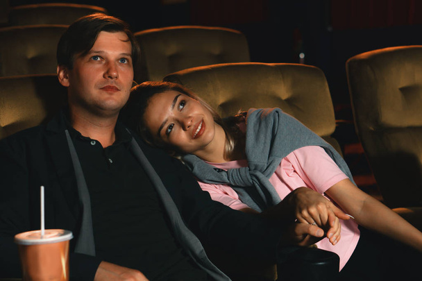 caucasian lover couple having romance moment watching movie toge - Фото, изображение