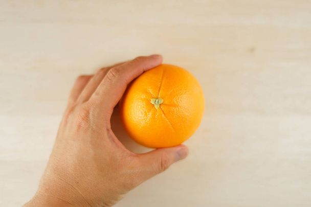 Orange of the image that was placed on the table - Фото, изображение