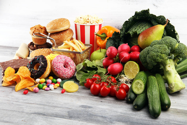 terveellistä tai epäterveellistä ruokaa. Käsitteen kuva terveestä ja epäterveellisestä
 - Valokuva, kuva