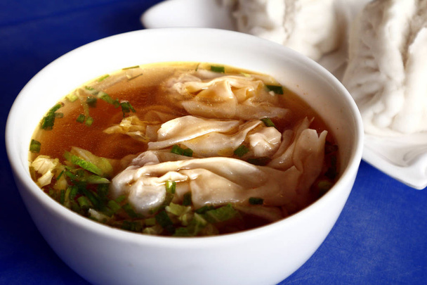 Wanton noodle soup and siopao - Photo, Image