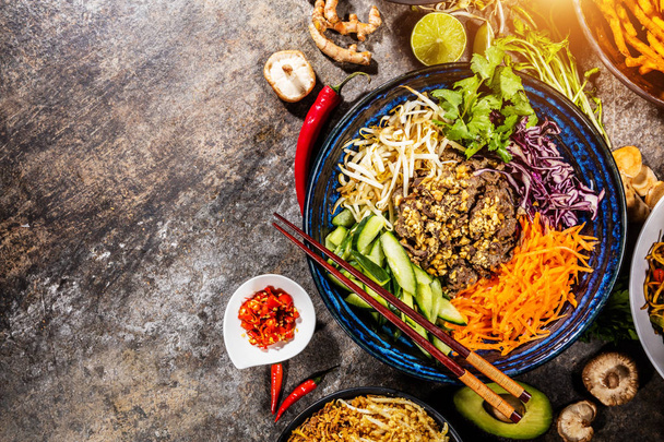 Top view composition of various Asian food in bowl - Valokuva, kuva