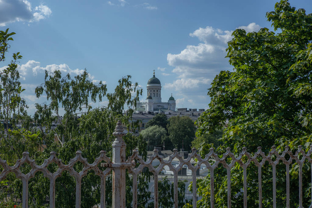 The white Helsinki cathedral seen from a distance in summer  - Photo, image