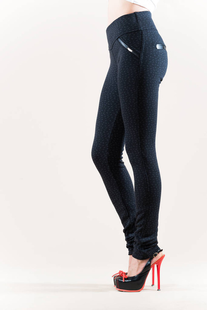 Beautiful slim female legs in beige high heel - Foto, immagini
