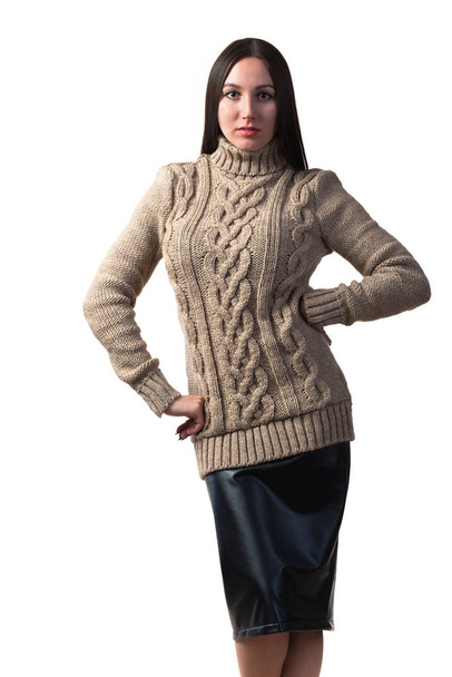 Stylish young woman in a knitted sweater - Foto, Imagen