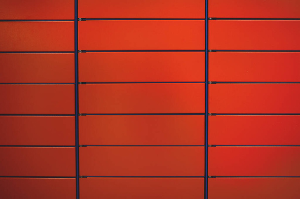 Текстурный абстрактный фон из красных прямоугольников
. - Фото, изображение