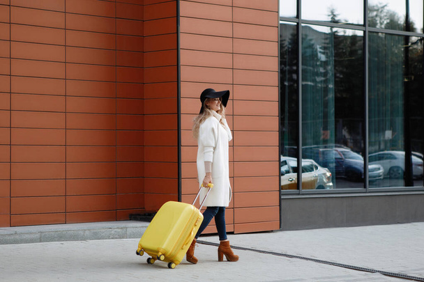 Travel concept. Young tourist woman walking. - Foto, Imagem