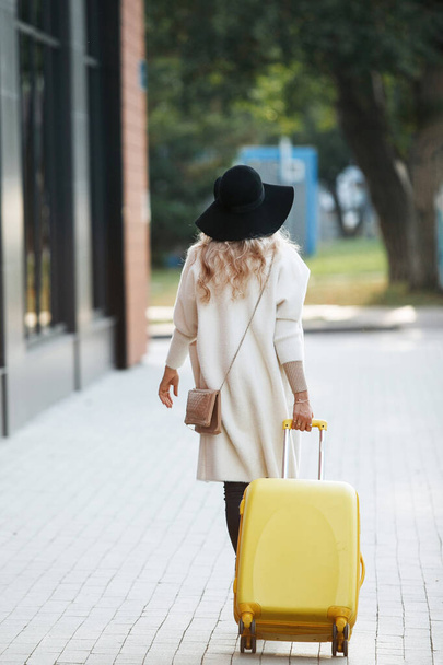 Travel concept. Young tourist woman walking. - Fotoğraf, Görsel