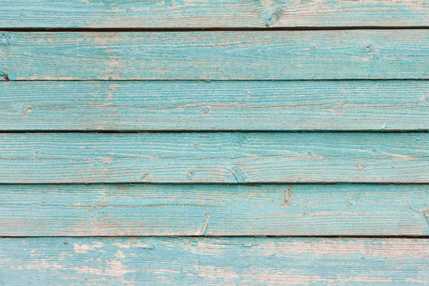 blauer Holzgrund, alte Holzwand mit Resten von türkisfarbener Farbe - Foto, Bild