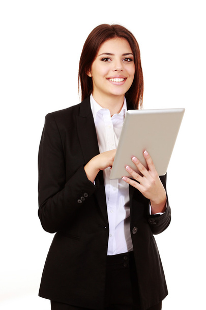 Young businesswoman using electronic tablet - Zdjęcie, obraz