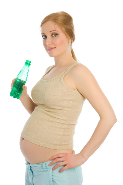Pregnant woman drink water - Foto, afbeelding