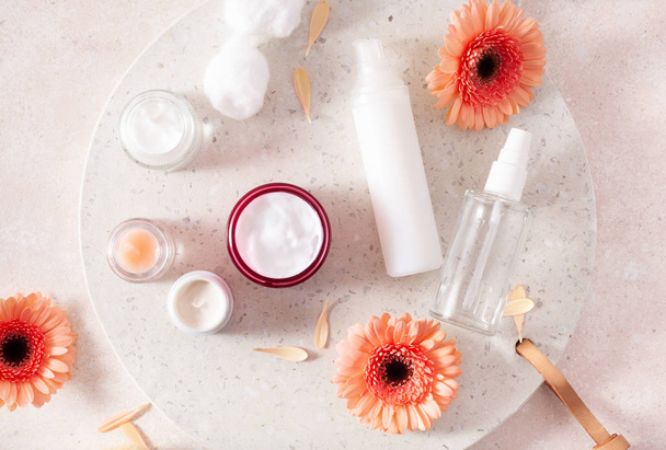 skincare products and daisy flowers. natural cosmetics for home  - Photo, Image
