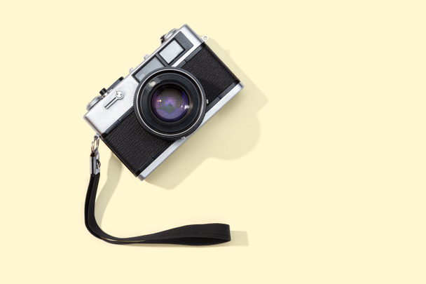 Flm camera isolated on yellow background - Foto, immagini
